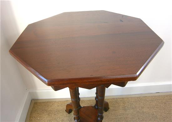 A Victorian mahogany octagonal table and a Liberty ebonised Hampden table Larger H.70cm